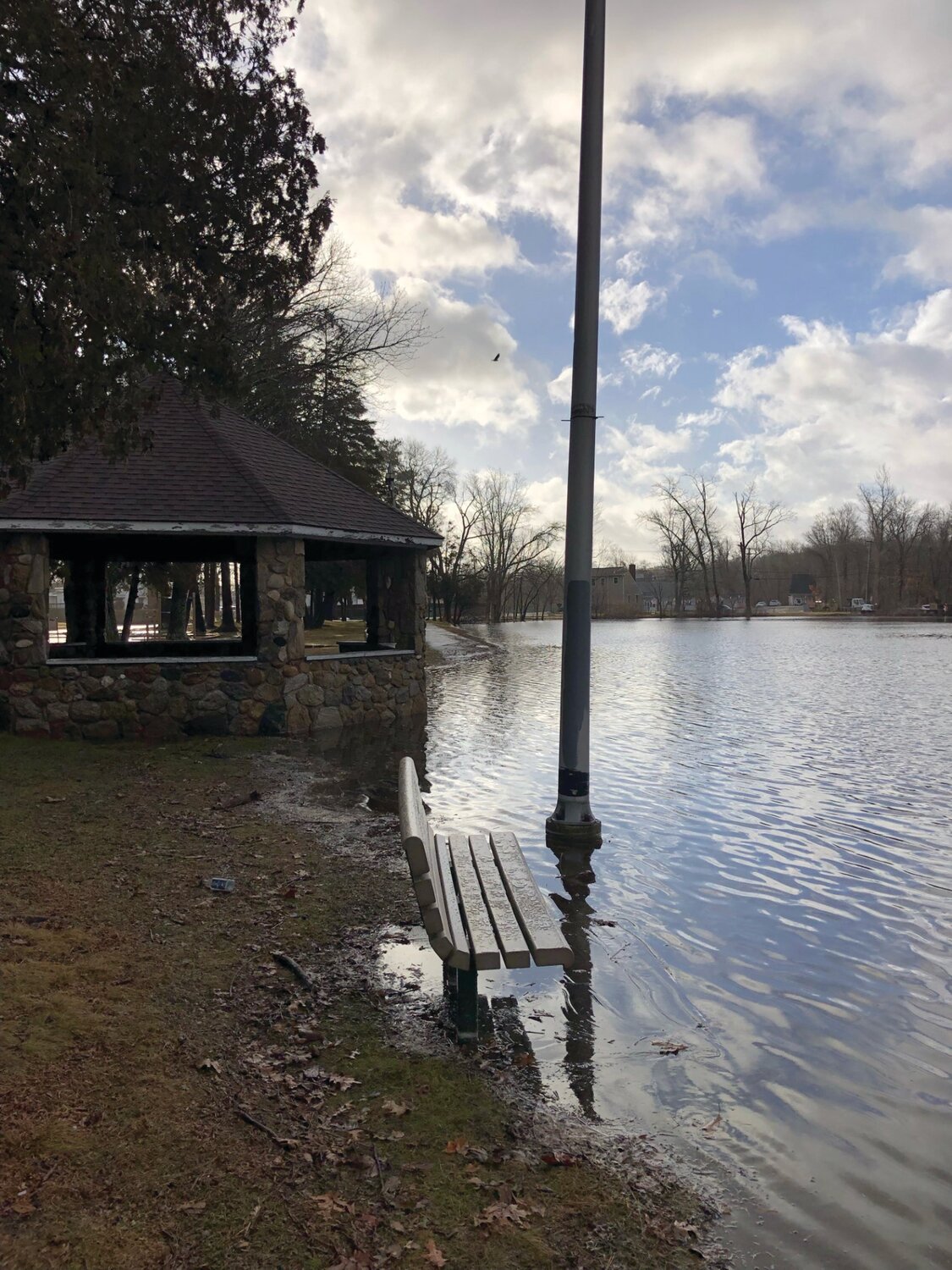 UNDER WATER: Johnston War Memorial Park was under water Wednesday morning. Memorial Boulevard was closed to traffic and impassable.